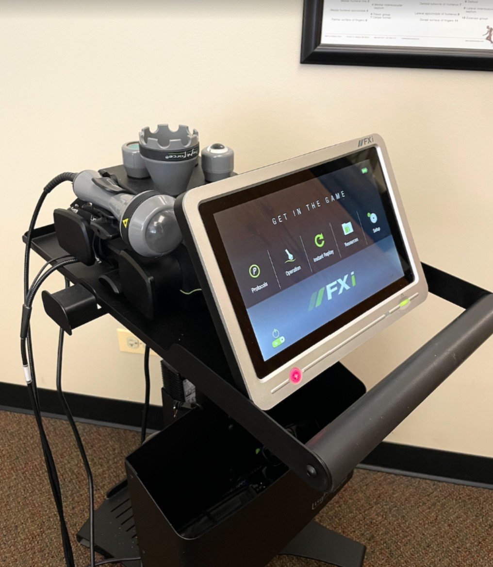 LightForce FXi Class IV therapy laser at True Health Chiropractic in Lombard, IL